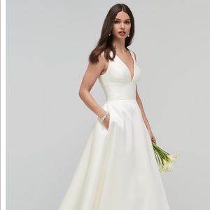 Wedding dress by Essence of Australia WToo